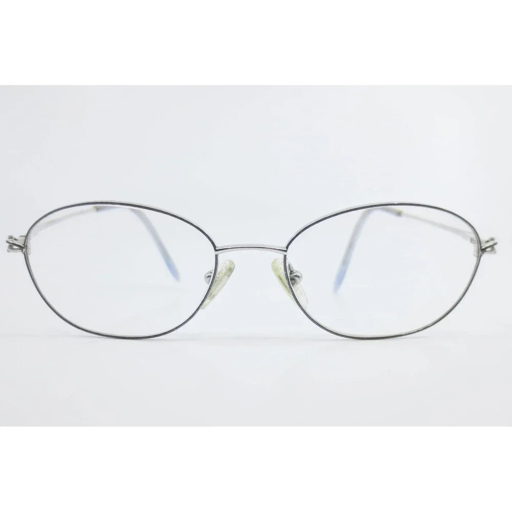 Manzini Eyewear Sea Mist 108 Titanium Oval Silver Frames 51-16-140 Demo Lenses